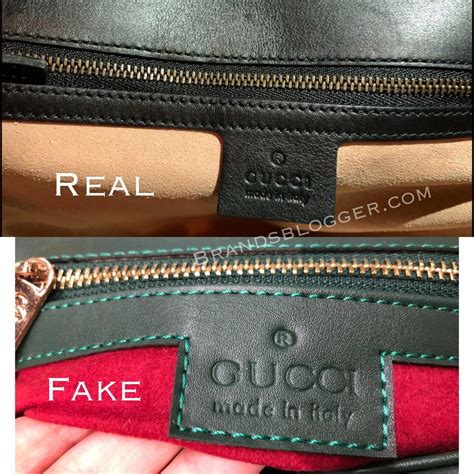 g zipper on gucci bag fake